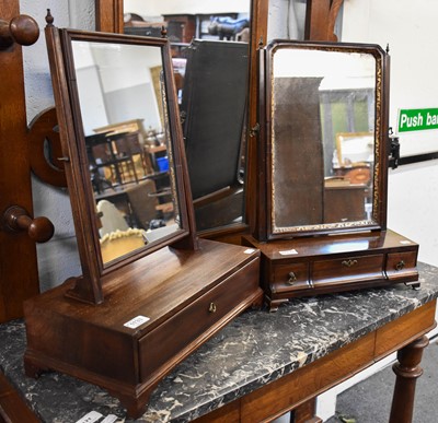 Lot 1133 - Three George III Mahogany Toilet Mirrors, each...