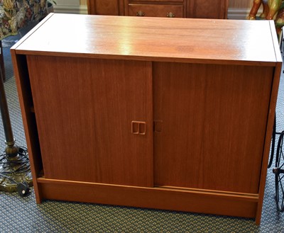 Lot 1340 - A Mid 20th Century Teak Low Cabinet, with two...