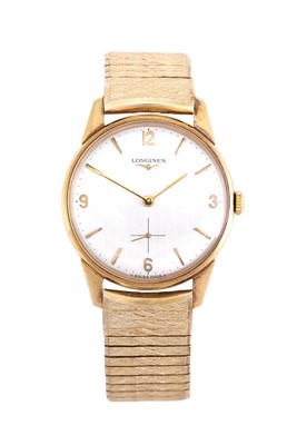 Lot 2393 - Longines: A 9 Carat Gold Wristwatch, signed...