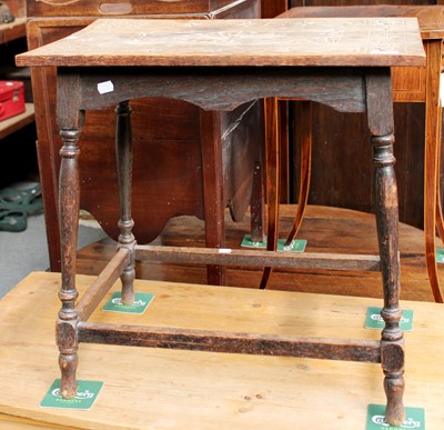 Lot 1250 - An Oak Occasional Table, with carved top,...