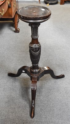 Lot 1267 - A Mahogany Tripod Torchere, carved in the Adam...