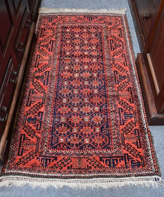 Lot 1229 - A Mashad Baluch Rug, the honeycomb lattice...