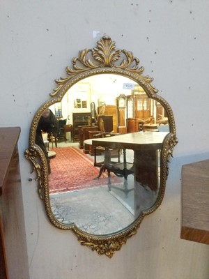 Lot 1533 - A Gilt Metal Floral Wall Mirror, together with...