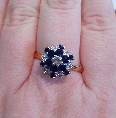 Lot 2090 - A Sapphire and Diamond Cluster Ring the...