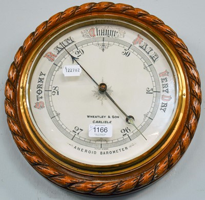 Lot 1166 - A 19th century Wheel Barometer, and a 1920s...