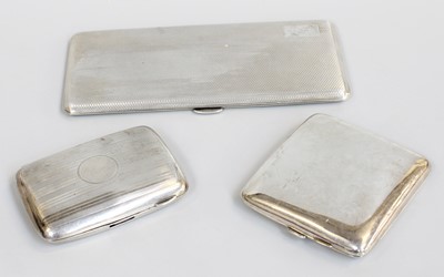 Lot 11 - Three Silver Cigarette-Cases, one oblong,...
