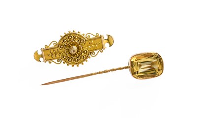 Lot 455 - A Citrine Stick Pin, the cushion cut citrine...