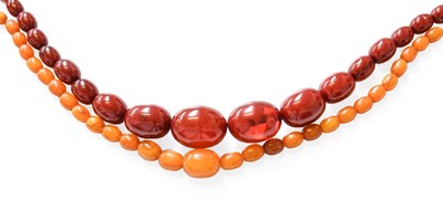 Lot 390 - A Graduated Amber Bead Necklace, length 18.5cm...