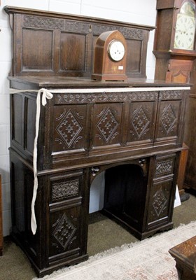 Lot 1227 - A Carved Oak Twin Pedestal Desk, early 20th...