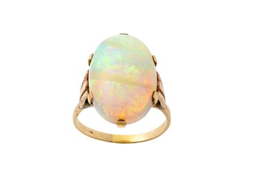 Lot 2074 - An Opal Ring the oval cabochon opal in a...