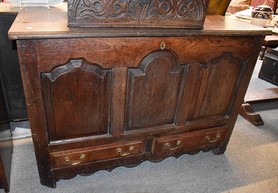 Lot 1135 - An Oak Mule Chest, 18th century with a panel...