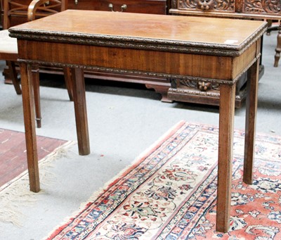 Lot 1226 - ~ A George III Mahogany Fold Over Card Table,...