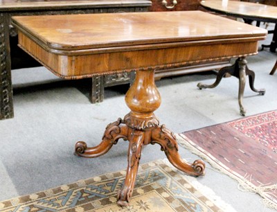 Lot 1222 - A Victorian Mahogany Fold Over Tea Table, on a...