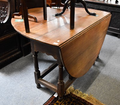 Lot 1197 - An Oak Gateleg Table, 18th century, with...