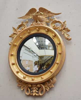 Lot 1336 - A Regency Style Convex Mirror, with eagle...