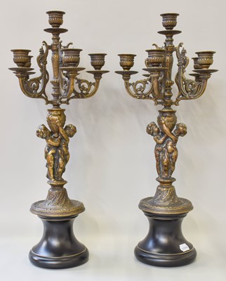 Lot 278 - A Pair of Patinated Figural Six Light...