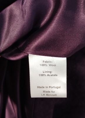 Lot 1055 - LK Bennett Wool Coat in a textured plum colour...