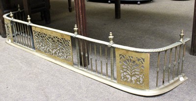 Lot 1474 - A Regency Brass Fire Curb, ornamented with urn...