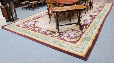 Lot 1253 - A Large Machine Made Carpet of Savonnerie...