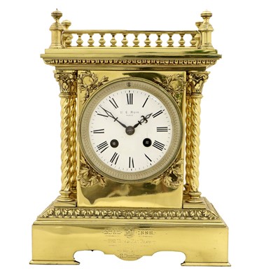 Lot 304 - A Brass Striking Mantel Clock, retailed by W.C....