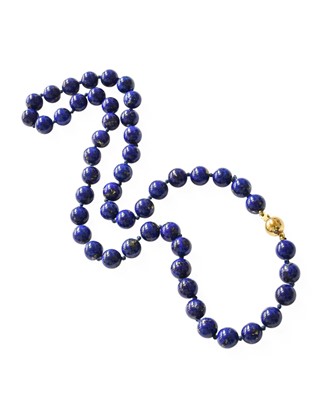 Lot 345 - A Lapis Lazuli Bead Necklace, uniform lapis...