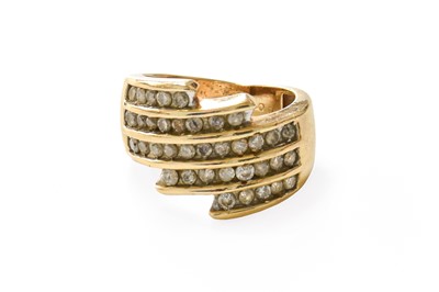 Lot 334 - A Diamond Crossover Ring, five rows of round...