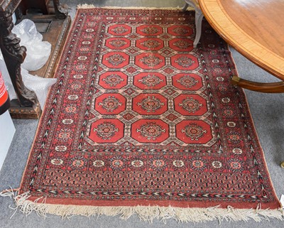 Lot 1235 - A Kashgai Carpet, the faded raspberry field...