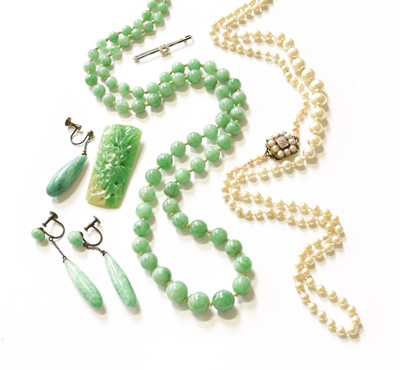 Lot 405 - A Jade Bead Necklace, comprising of graduated...