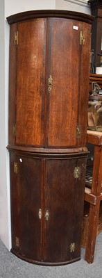 Lot 1368 - A George III Oak Bow Front Hanging Corner...