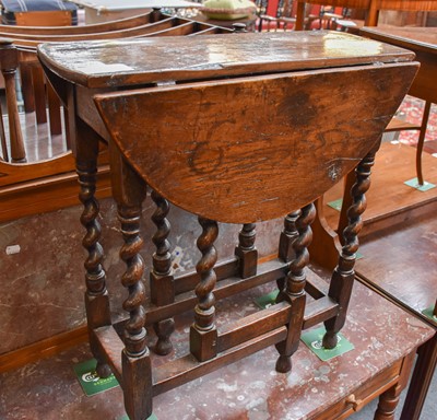 Lot 1270 - ~ A Small Oak Gateleg Table, on barley twist...