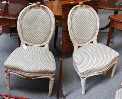 Lot 1281 - ~ A Pair of French Painted Side Chairs, in...