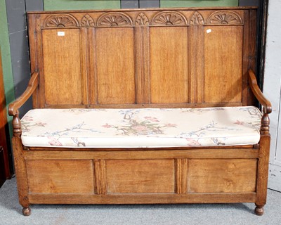 Lot 1291 - A 20th Century Carved Oak Four Panel Box...