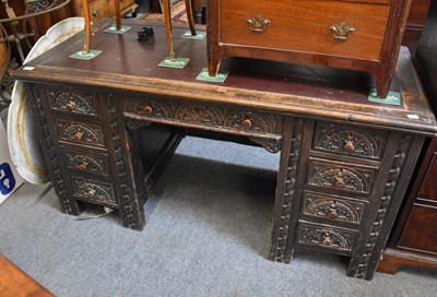 Lot 1212 - A Carved Oak Pedestal Desk, composed of period...