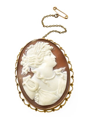 Lot 408 - A Shell Cameo, depicting Calliope, in a yellow...