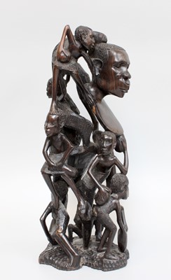 Lot 149 - A Makonde Tree of Life Carved Ebony Figure, 36cm