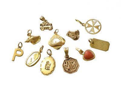 Lot 460 - Eleven Charms/Pendants, of varying designs...