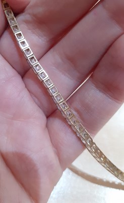Lot 2021 - A 9 Carat Gold Cubic Zirconia Necklace and...