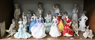 Lot 257 - A Collection of Royal Doulton Ladies and Nao...