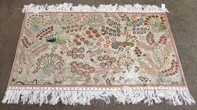 Lot 1234 - A Chinese Silk Rug, the ivory field of birds,...