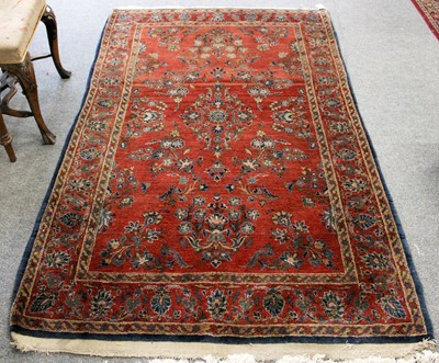 Lot 1235 - Saroukh Rug, the brick red field of sprigs...