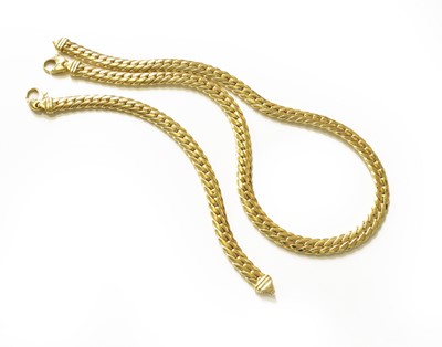 Lot 484 - A Flat Curb Link Necklace and Bracelet Suite,...