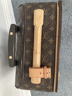 Lot 1049 - Louis Vuitton Pegase 45 Suitcase, in brown...