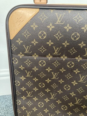 Lot 1049 - Louis Vuitton Pegase 45 Suitcase, in brown...