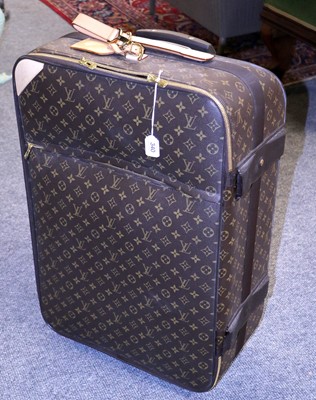 Lot 340 - Louis Vuitton Pegase 65 Suitcase, in brown...