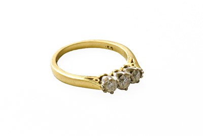 Lot 492 - An 18 Carat Gold Diamond Three Stone Ring, the...