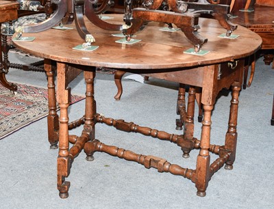 Lot 1441 - An 18th Century Oak Gate Leg Dining Table, on...