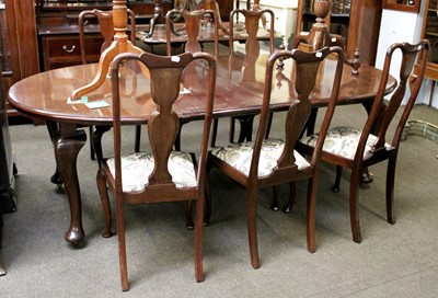 Lot 1411 - A Mahogany Wind-Out Dining Table, with two...