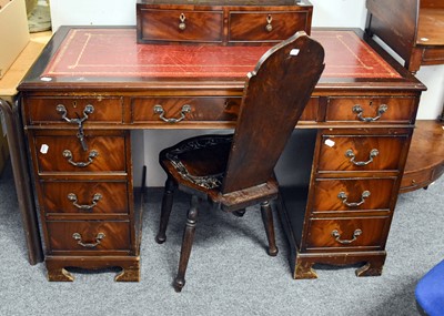 Lot 1216 - A Reproduction Mahogany Leather-Inset Twin...