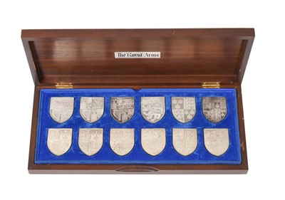 Lot 2358 - A Cased Set of Twelve Elizabeth II Silver Depictions of the Royal Coats-of-Arms