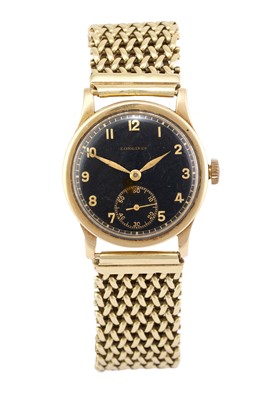 Lot 2387 - Longines: A 14 Carat Gold Wristwatch, signed...